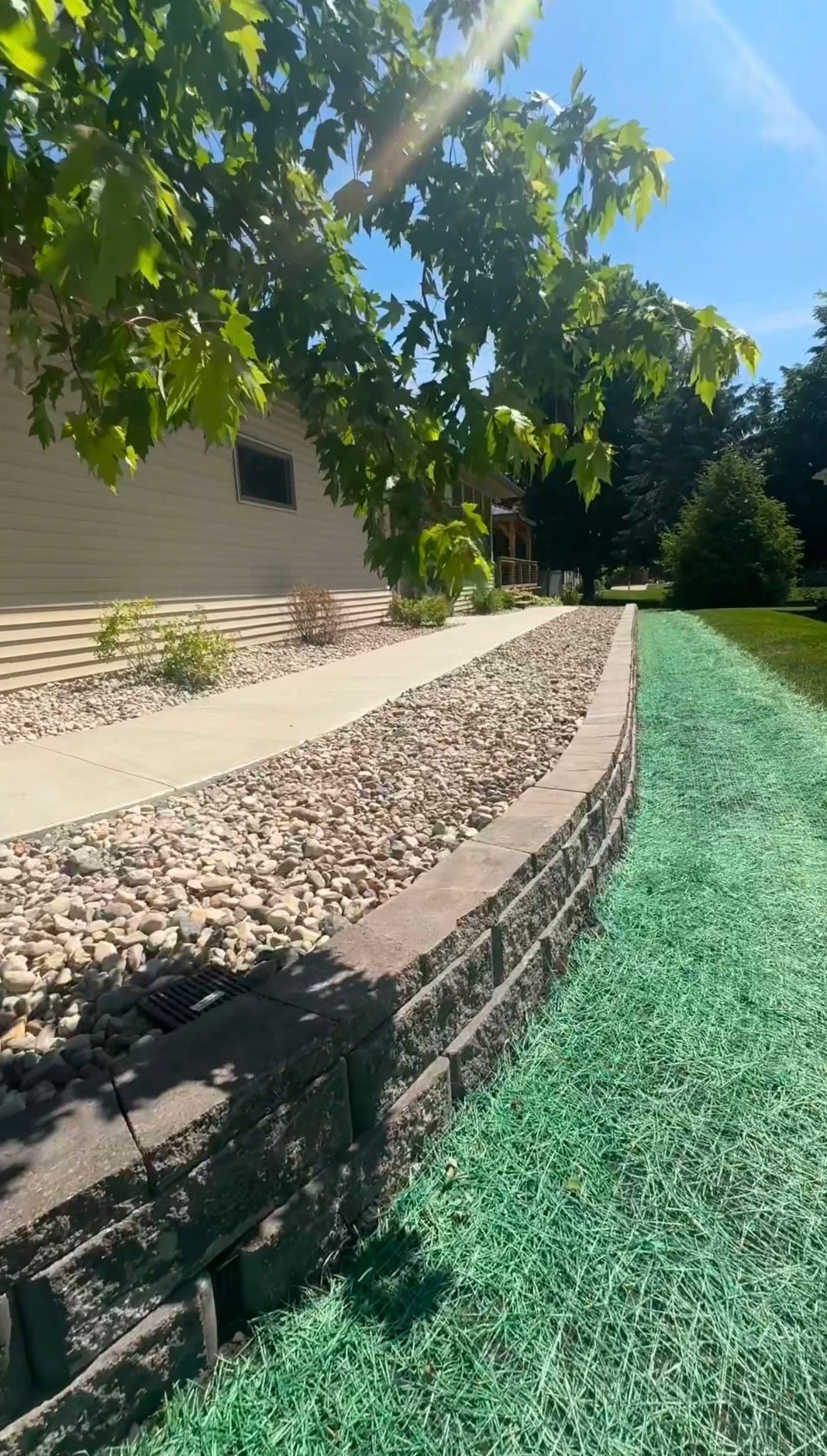 70-Foot Concrete Sidewalk with Drainage and Retaining Wall in Sauk City