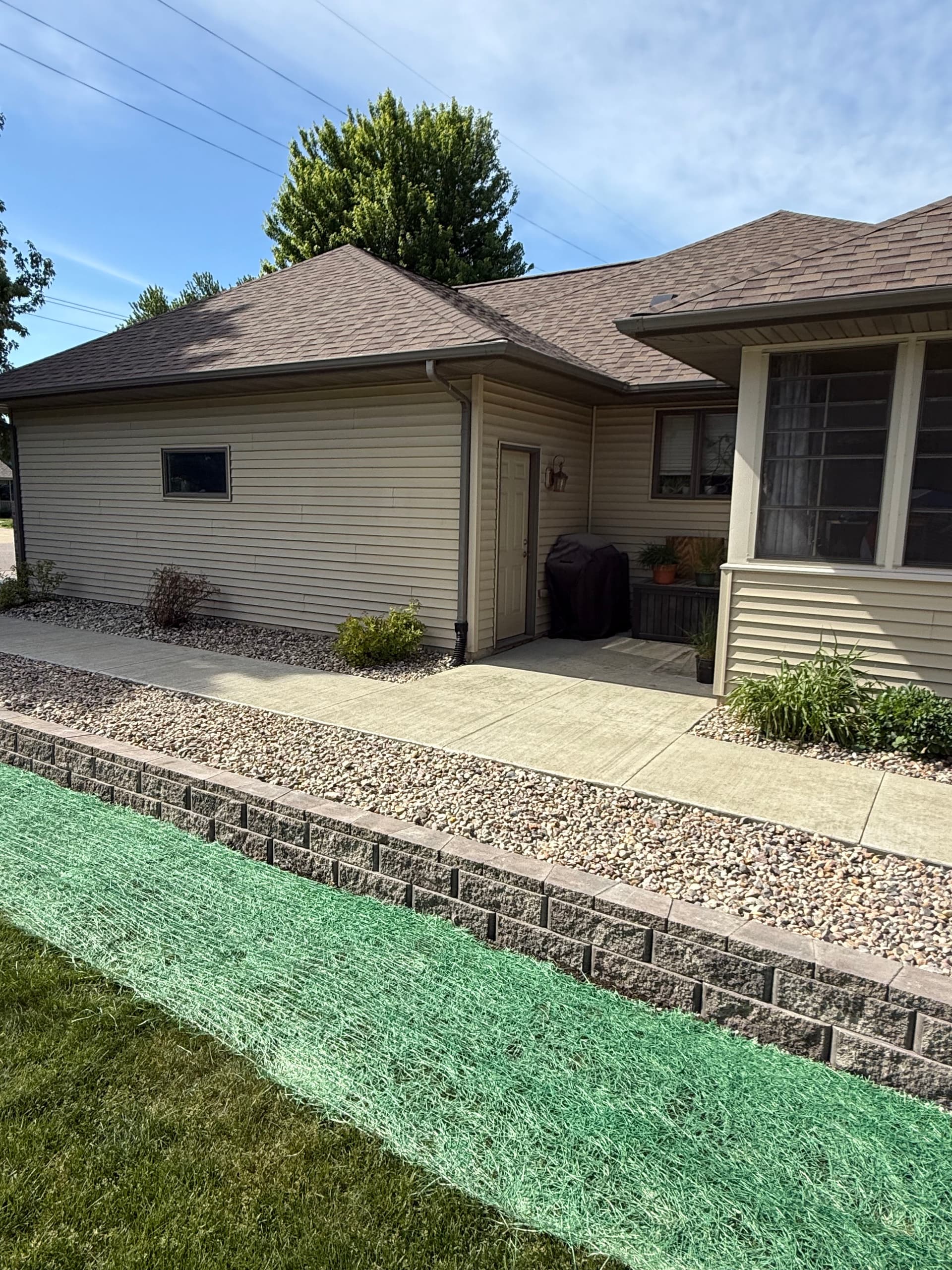 70-Foot Concrete Sidewalk with Drainage and Retaining Wall in Sauk City