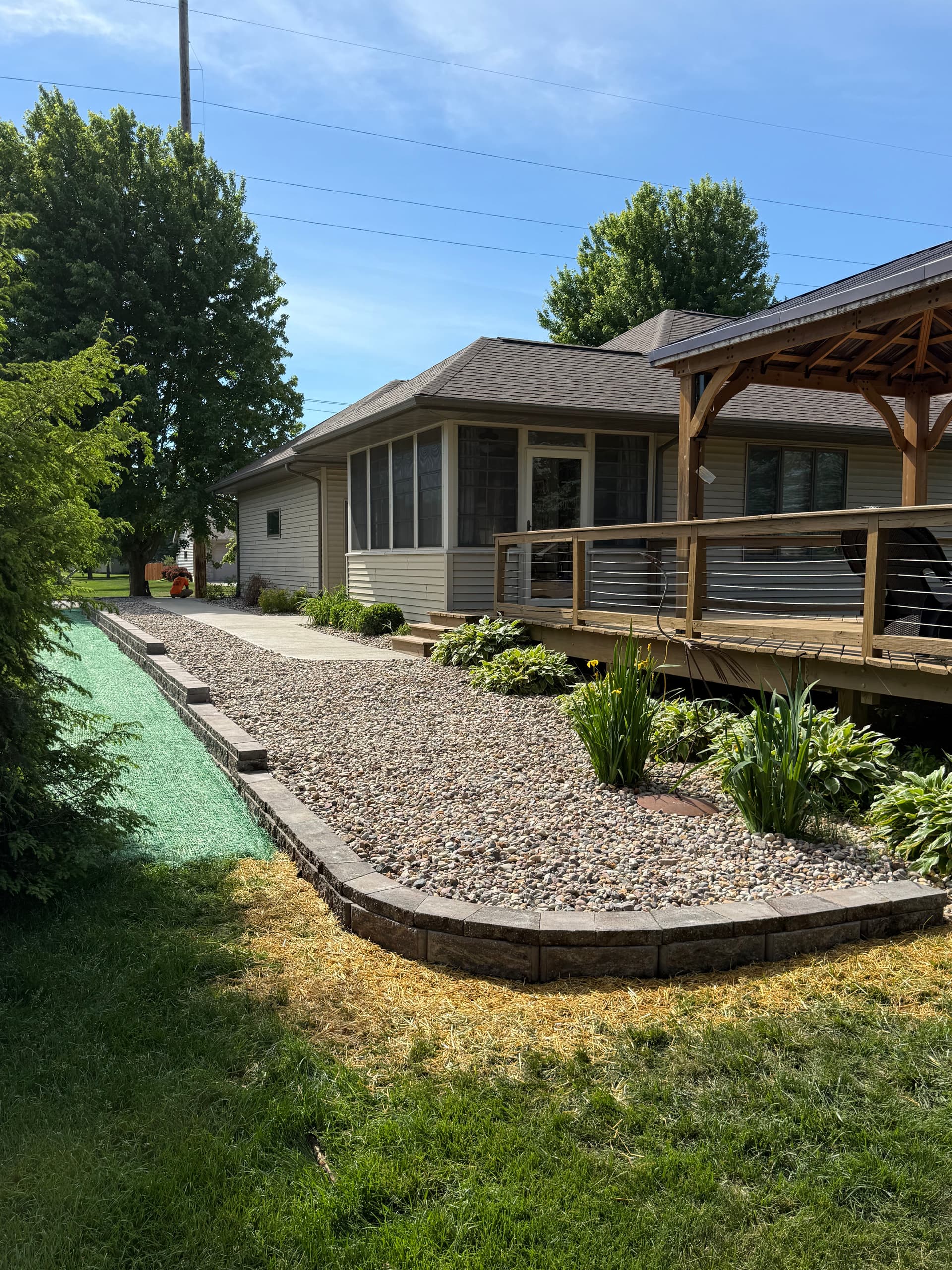 70-Foot Concrete Sidewalk with Drainage and Retaining Wall in Sauk City